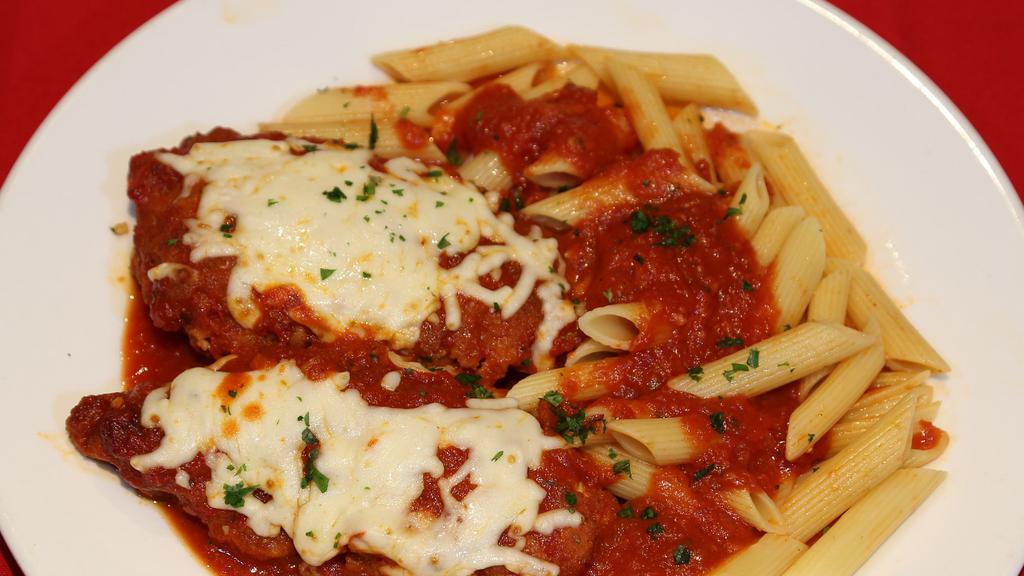 Chicken Parmigiana (Gf) · Chicken cutlet layered with marinara and melted mozzarella served with penne marinara. Gluten free available.