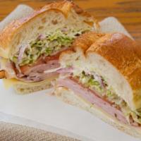 Honey Smoked Turkey Sandwich · comes with lettuce, tomato on the roll