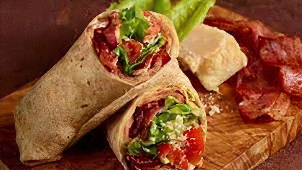 Blt Wrap  · Served with bacon, lettuce, and tomato wrapped in a flour tortilla.