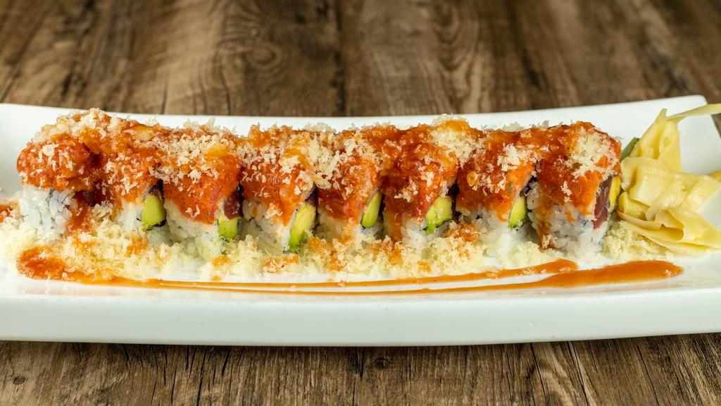 Crunch Roll · Crunch & spicy tuna topped tuna & avocado roll with spicy sesame sauce.Spicy