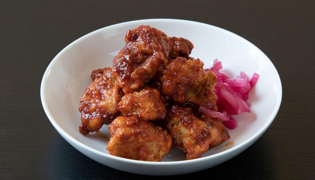 Spicy Gochujang Fried Chicken (Lg) · Crispy fried chicken thighs tossed with a sauce of gochujang, garlic, sesame and honey.