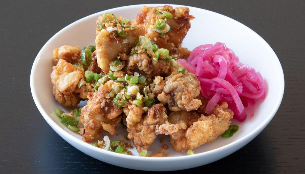 Black Pepper Garlic Fried Chicken (Med) · Crispy fried chicken thighs tossed with caramelized garlic, black pepper, scallions and sea salt.