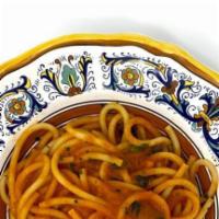 Bucatini Al Pomodoro · Bucatini pasta in homemade tomato sauce.