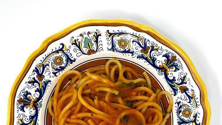 Bucatini Al Pomodoro · Bucatini pasta in homemade tomato sauce.