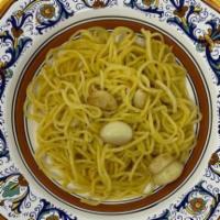Spaghetti Aglio E Olio · Homemade spaghetti with garlic and olive oil.