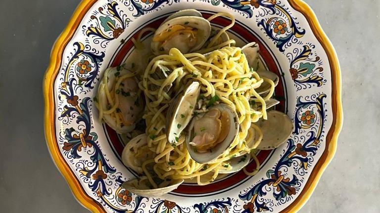 Spaghetti Alle Vongole · Homemade spaghetti with clams in garlic and olive oil.