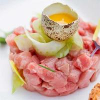 Yellowtail Tartar · Yellowtail served with ouail egg and chef special sauce.
