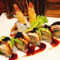 Crazy Dragon · Shrimp tempura, seaweed salad inside, top with eel and avocado, served with eel sauce.