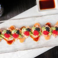 River King Roll · King crab meat with tuna, salmon, yellowtail, and avocado served with spicy eel sauce.