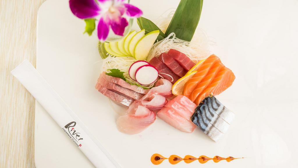 Sashimi Deluxe · 18 pcs of assorted sashimi and rice.