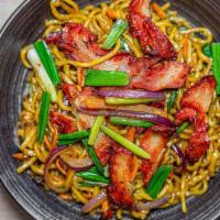 Stir Fried Noodles · Hand  pulled noodles, carrots onion, scallion and your choice of protein