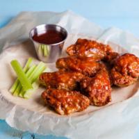 Hot Wings - Bone-In · Classic bone-in wings fried, topped with High-heat hot sauce, cooked to order and perfectly ...