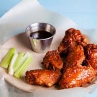 Bbq Wings - Bone-In · Classic bone-in wings fried, topped with BBQ sauce, cooked to order and perfectly crisp.