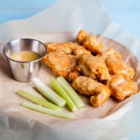 Garlic Parmesan Wings - Boneless · Classic boneless wings fried, topped with Garlic Parmesan sauce, cooked to order and perfect...