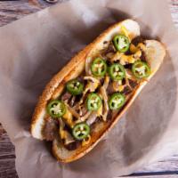 Jalapeño Cheesesteak Sandwich · Hot N' Tasty sandwich made with Beef steak, melted cheese, jalapeños, sautéed onions, and gr...