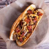 Bacon Cheesesteak Sandwich · Hot N' Tasty sandwich made with Beef steak, bacon, melted cheese, sautéed onions, and green ...