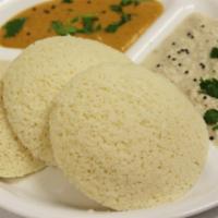 Idly ( 3 Pcs ) · Steamed rice cakes.