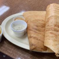 Masala Dosa · Filled with mildly spiced mashed potatoes and onions.