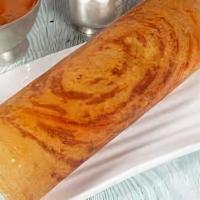 Bangalore Butter Masala Dosa · Topped with homemade mild spicy powder, mashed potatoes and roasted with butter.