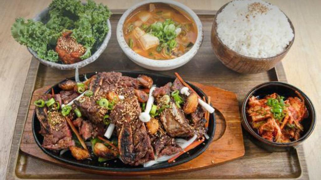 Korean Short Ribs · 24 hour marinated short ribs, grilled and served with accompaniments.