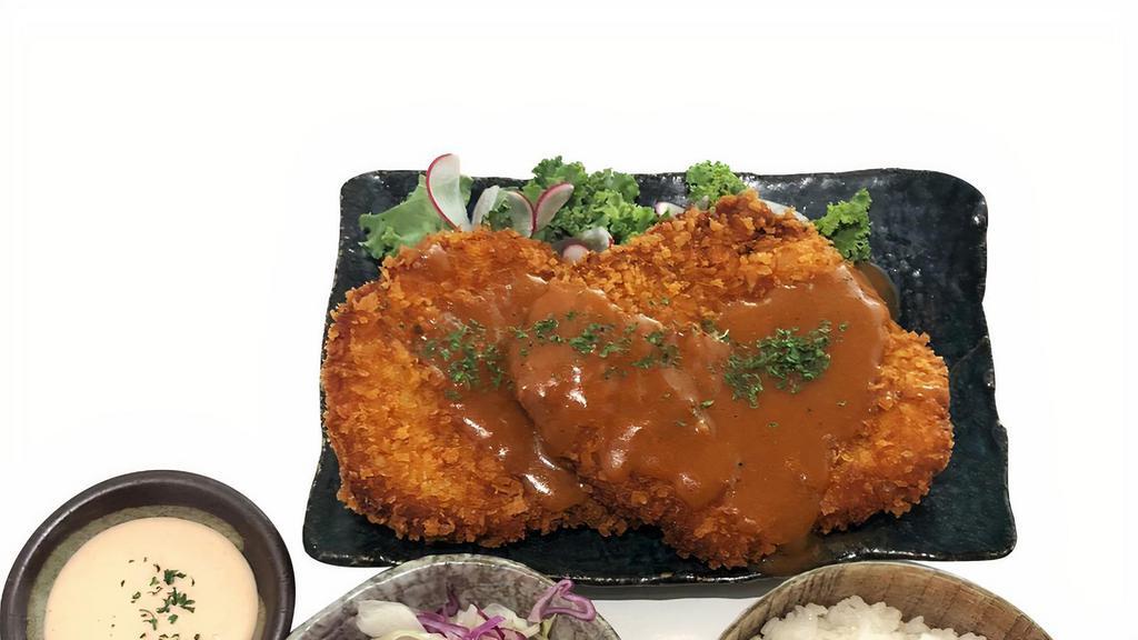 Katsu (Pork) · Fried cutlet with rice and cabbage salad (side of kimchi). Topped with homemade gravy sauce, contain nuts.