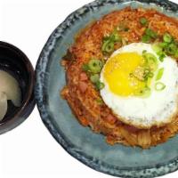 Kimchi Fried Rice · Kimchi (homemade) fried rice with chopped ham, comes with cabbage salad, pickled raddish and...