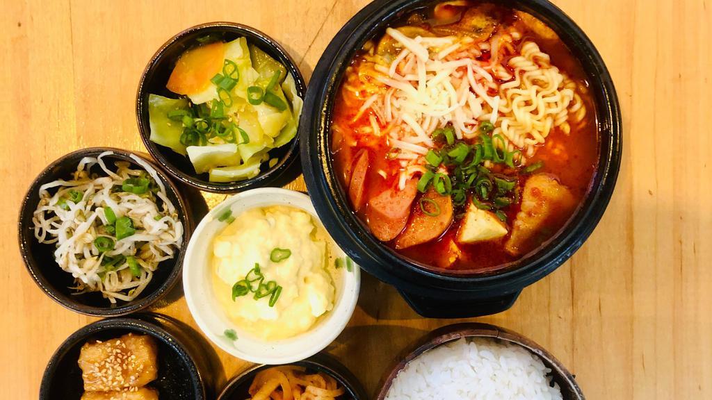 Army Stew · A Korean favorite with sausage, ham, ramen, cheese  and kimchi