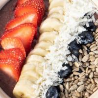 Acai Bowl · Acai, banana, blueberry, red apple topped with granola, banana slices, and strawberries.