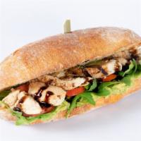 Chicken Club Sandwich · Chicken, tomatoes, avocado, cheddar cheese, arugula and balsamic glaze on toasted ciabatta b...
