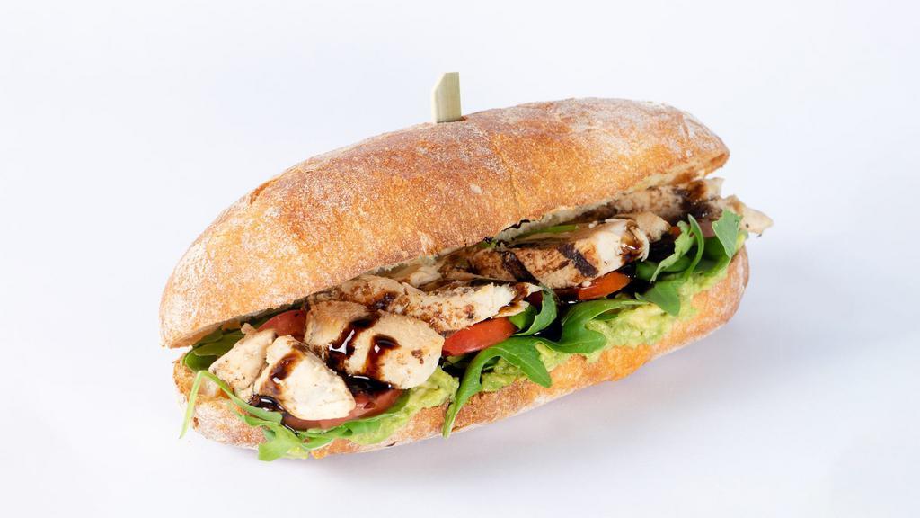Chicken Club Sandwich · Chicken, tomatoes, avocado, cheddar cheese, arugula and balsamic glaze on toasted ciabatta bread.