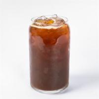 Iced Americano · Two shots of freshly roasted espresso over water and ice.