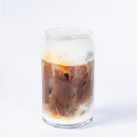 Iced Cappuccino · Two shots of freshly roasted organic espresso with your choice of milk, topped with foam (12...