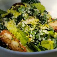 Caesar · Romaine, kale, parmesan, croutons, anchovy dressing.