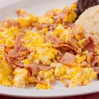 Huevos Con Jamon · Ham and eggs. With tortillas and beans.