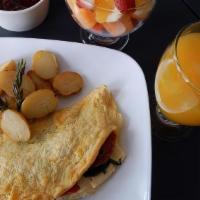 Cafe Con Pan Omelette · Ham with Onions, Bell Peppers and Oaxaca Cheese. Made with three eggs. Served with fries. Wi...