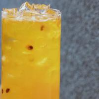 Heat Wave · Passion Fruit green tea made with REAL passion fruit juice and green tea. Iced only.