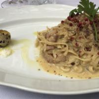 Tortino Di Carciofi E Porri Con Pecorino  · Oven-baked strained artichokes and leeks with pecorino, sautéed cherry tomatoes, and caulifl...