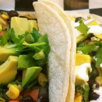 Veggie Tacos · Sauteed mushrooms, lentils, shredded cabbage,pico de gallo, and avocado.