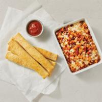 Meaty Marinara · Italian-seasoned meat sauce and rotini topped with cheese and then oven-baked. 850 cal. per ...