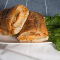 Godmother Hero · Breaded chicken served on the garlic bread topped with creamy vodka sauce & melted mozarella...