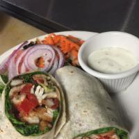 Grilled Chicken Wrap · Grilled chicken, roasted peppers, fresh mozzarella and lettuce with balsamic vinaigrette dre...