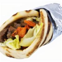 Combo Gyro · Halal. Lamb and chicken served on pita with choice of salad and any shahs sauces.