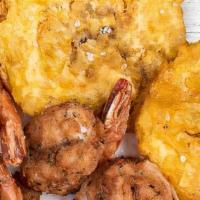 Camarones Empanizados · Breaded shrimp.