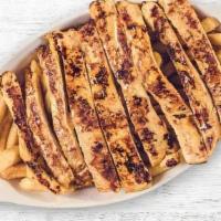 Kids Trocitos De Pollo Con Papitas Fritas · Grilled chicken with french fries.