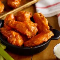 Chicken Wings · Choose mild or hot Buffalo, hickory bourbon, or Nashville hot.