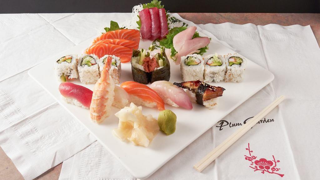 Sushi & Sashimi Combination Dinner · A generous assortment of nigiri sushi, sashimi, and California roll sushi. Served with salad.