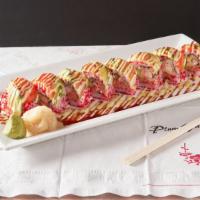 Screaming Roll · Spicy tuna, shrimp tempura, avocado topped with white tuna, salmon, avocado and black tobiko.