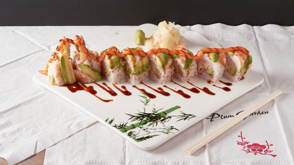 Crystal Bubble Roll · Shrimp tempura, radish, lettuce and cucumber wrapped in soy paper, topped with shrimp, avocado and spicy mayo sauce.