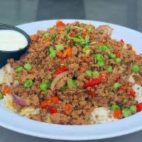 Chop Chop · Ground turkey, sautéed onions, sweet peas, green & red peppers, over coconut rice with diced...