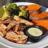 Paleo Bowl · Grilled chicken, roasted sweet potato , and steamed broccoli paired with a lemon olive oil s...